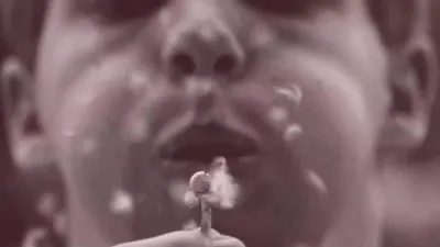 Engaging Slow-Motion Footage Of People Reacting Creatively In Sepia Tone.