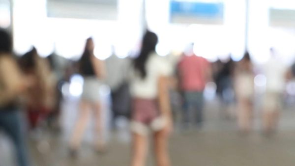 A Stylish Video Of A Blurred Crowd Walking In A Busy Indoor Station. (Thumbnail)